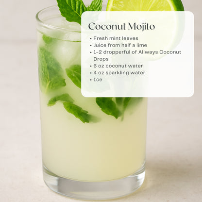 Coconut mojito with mint leaves and lime slices, accompanied by a recipe card.