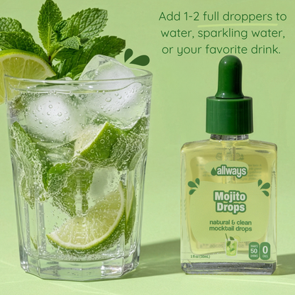 Glass of mojito with lime and mint leaves next to a bottle of 'Allways Mojito Drops' on a green background.