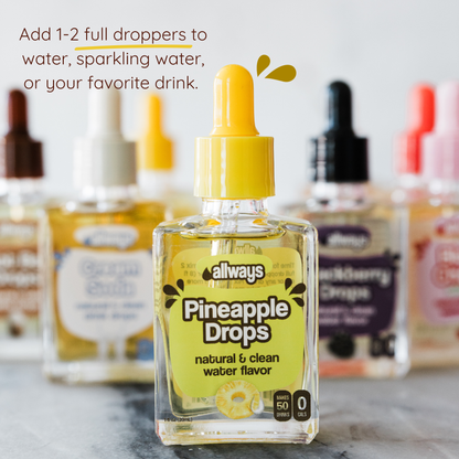 Bottle of Pineapple Drops with dropper on a blurred background of other similar bottles.